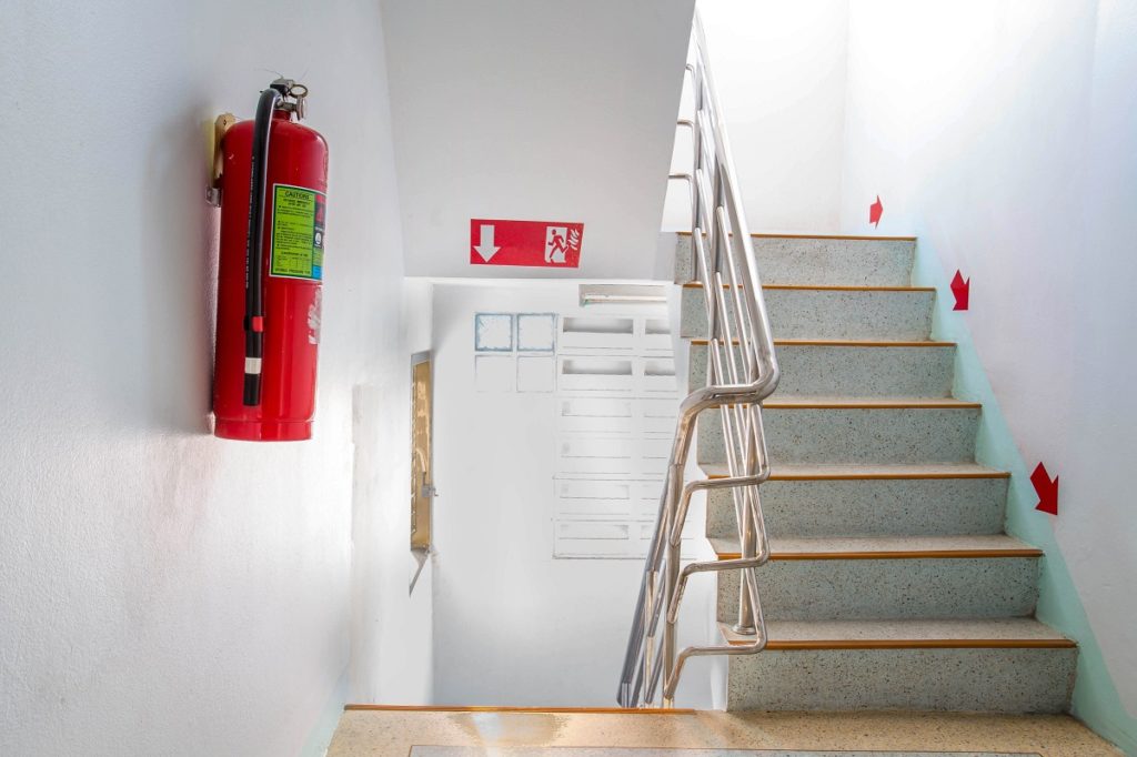 Fire exit sign and fire extinguisher