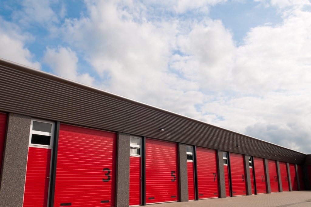 storage unit with red garage doors