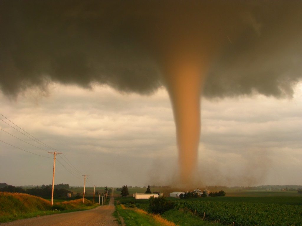 Tornado passing by a small town