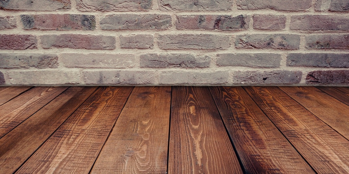 wooden floor and brick wall