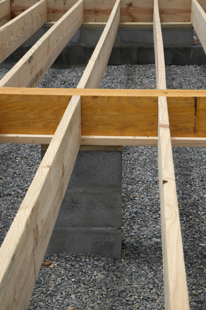 A wooden house frame, floor joists