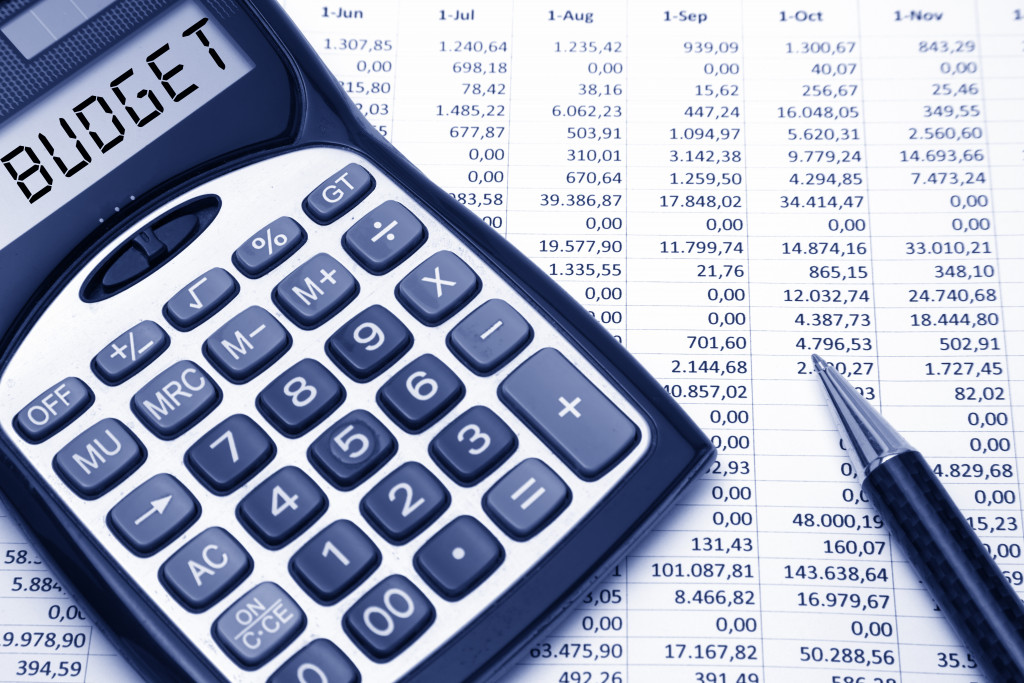 budget word on calculator with financial data