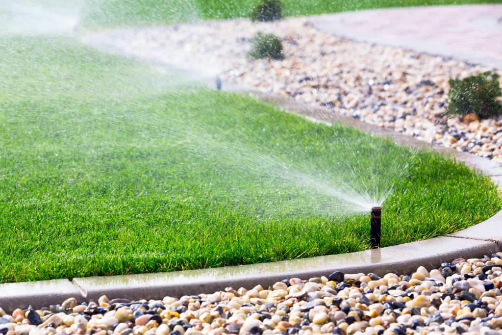 A water sprinkler on a lawn